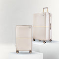 Beige hard-shell polycarbonate trolley luggage set with two stacked cases and wheels
