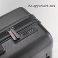 Dark grey hard-shell polycarbonate suitcase with TSA-approved lock and zipper closure.