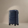 Dark blue polypropylene cabin trolley suitcase with 8 wheels and telescopic handle