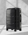 Hard-shell polypropylene check-in trolley suitcase, black, with 8 wheels and side handle