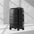 Hard-shell polypropylene check-in trolley suitcase, black, with 8 wheels and side handle