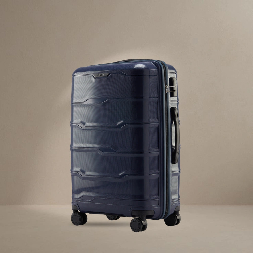 Hard-shell polypropylene check-in trolley suitcase, blue, with 8 wheels and side handle
