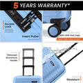 Light blue suitcase features: access lock, wheel caps, water-resistant design