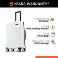 White cabin suitcase with black telescopic handle and caster wheels, side view