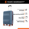 Blue small cabin suitcase with telescopic handle and 8 wheels, side ribs and trims