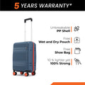 Small cabin suitcase with 8 wheels, dark blue PP shell, telescopic handle, front view.